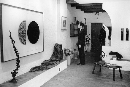 Fernand F. Haenggi at Gallery 101, Rand Central, Johannesburg, in 1966, viewing works by Johan van Heerden, Ernst de Jong, Walter Battiss and others