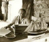Gordon Vorster working on one of his novels at home (photo © Marianna Christine du Toit Facebook archives) 